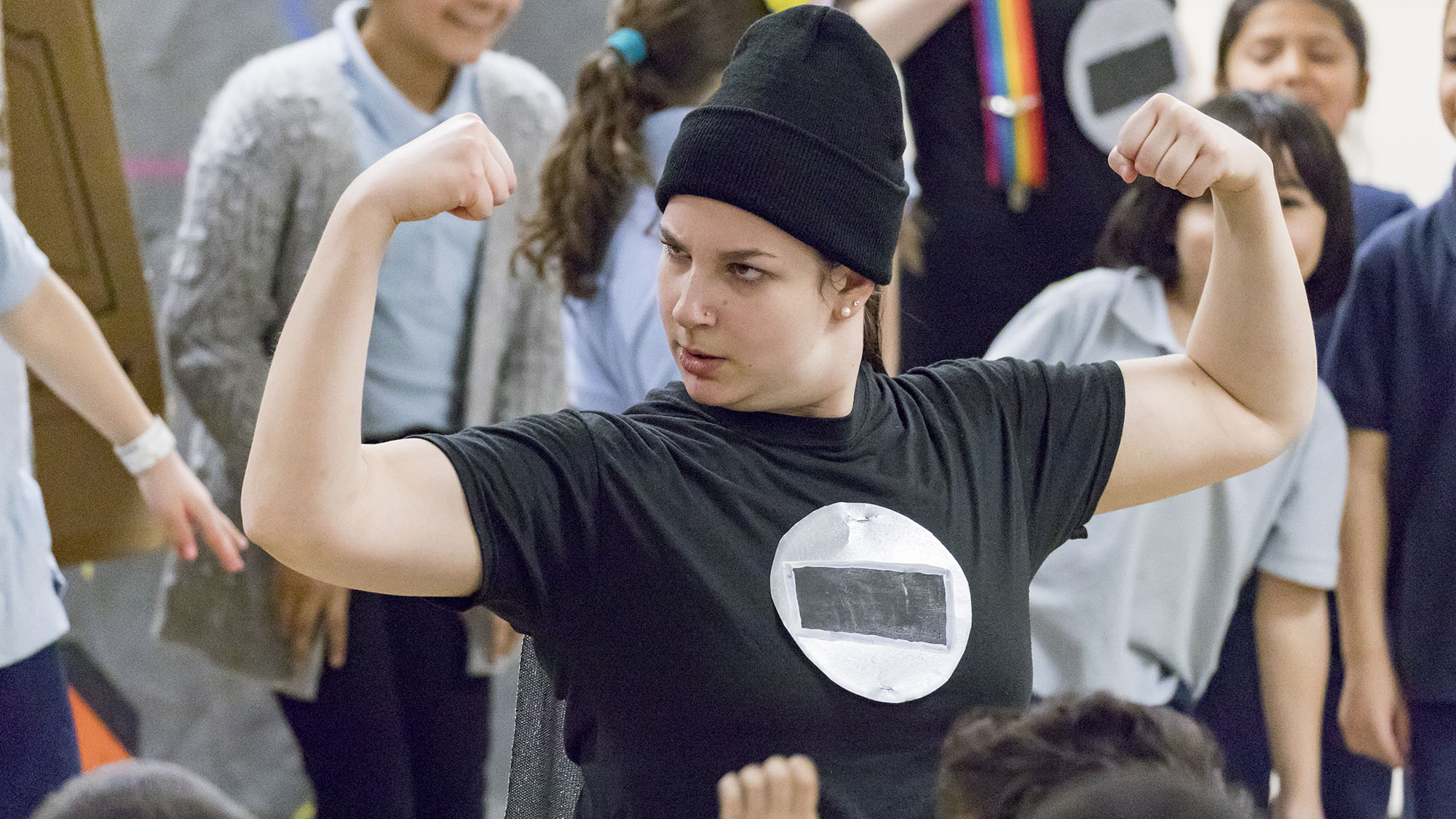 Image for At times, a handful of Cleveland students are invited to participate up front, while others are led through a dance in their seats.